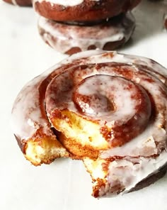 glazed doughnuts with icing and cinnamon on top