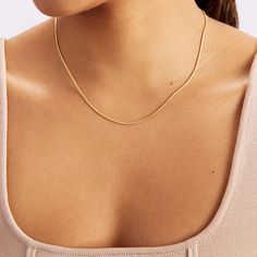 At its finest, a chain necklace. The snake chain necklace is a versatile accessory that may be worn alone or layered. Choose your own day and give your present in your own unique style. 14k solid gold handcrafted necklace 100% ethical sourced jewelry Material: 14k Solid Gold Chain Width: 1.5 mm / 2 mm Chain Style: Cable Chain Chain Length: 18 inch Gold Neck Chains For Women Design Latest, Gold Plated Snake Chain Necklace, Yellow Gold Snake Chain Necklace, Classic Yellow Gold Snake Chain Necklace, Everyday Yellow Gold Adjustable Snake Chain Necklace, Classic 14k Gold Snake Chain Necklace, Gold Plated Clavicle Snake Chain Necklace, Classic Yellow Gold Snake Chain Necklace With Adjustable Chain, Gold Plated Snake Chain Necklace For Everyday