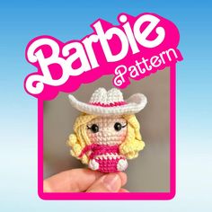 a crocheted doll with a cowboy hat on it's head is shown