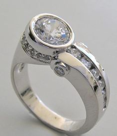 a white gold ring with diamonds on it