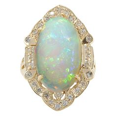 Stamped: 14K Yellow Gold Total Ring Weight: 10.0 Grams Total Natural Opal Weight is 8.25 Carat (Measures: 18.00x13.00 mm) Color: Multicolor Diamond Weight: Total Natural Diamond Weight is 0.80 Carat Color: F-G, Clarity: VS2-SI1 Face Measures: 29.20x18.80 mm Sku: [704233W] Opal Wedding Ring Set, Yellow Gold Cocktail Ring, Boulder Opal Ring, Opal Diamond Ring, Opal Wedding Rings, Yellow Gold Diamond Ring, Diamond Jewelry Designs, La Face, Gold Diamond Ring