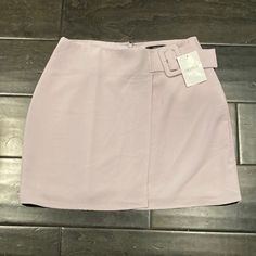 This Is A Super Cute Asymmetric Miniskirt From Forever 21 With A Built In Side Belt On The Waist. It Is Brand New With Tags - I’m Selling Because I Originally Ordered It Online And It Didn’t Fit. The Tag Says “Lavender” But I Would Describe It As More Of A Dusty Lilac Color Because The Purple Is More Subtle Than Vibrant (If That Makes Any Sense). It Kills Me That This Doesn’t Fit Because I Love This Skirt So Much, So Hopefully You Will Love As Much As I Do And Wear It All The Time! Size Medium, Spring Skort For Date Night, Spring High-waisted Mini Skirt For Date Night, High-waist Mini Skirt For Spring Date Night, High Waist Mini Skirt For Date Night In Spring, Spring Mini Hem Skirt For Work, Asymmetrical Mini Skirt For Spring Night Out, Trendy Asymmetrical Skort For Work, Forever 21 Elegant Mini Skirt For Spring, Elegant Spring Mini Skirt By Forever 21