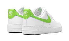 The Women’s Nike Air Force 1 Low “Action Green” is a women’s-exclusive colorway of the classic sneaker with eye-catching lime green accents.  The “Action Green” is a versatile colorway of the Air Force 1 that features a white leather construction with tonal leather overlays throughout the design.  An Action Green leather Swoosh can be found on the sides.  More lime green detailing lands on the green “Nike Air” logo embroidered on the heel and on the “Air Force 1” branding on the tongue and “AF1” Lime Green Nike Shoes, Green Nike Shoes, Nike Air Logo, Air Logo, Dance Comp, Trendy Shoes Sneakers, Air Force One, Force One, Nike Air Force 1 Low