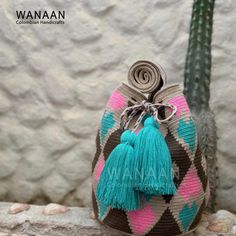 100% Handmade crochet crossbody handbag made by the skilled artisans of the Indigenous Wayuu tribe in the northern desert region of Colombia. This art of crocheting is a tradition passed down from generation to generation, and it is the livelihood of their community. A stylish and versatile bag with a big capacity and beautiful colors that match perfectly for all occasions. Ideal for work and daily use, travels, beach, camping, or special occasions. It is the Perfect gift for any occasion! -Wash Multicolor Handwoven Bucket Bag As A Gift, Multicolor Woven Bucket Bag As Gift, Multicolor Woven Bucket Bag Gift, Multicolor Crochet Bag With Adjustable Strap Gift, Gift Multicolor Crochet Bag With Adjustable Strap, Pink Woven Crochet Bag As Gift, Pink Woven Crochet Bag For Gift, Handmade Artisan Crochet Bag For Festival, Pink Woven Crochet Bag Gift