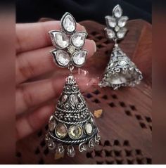 Eye-catching long jhumka , 4cm long  High-quality silver finish  Beautiful drops  Please check out our other listings https://www.etsy.com/shop/araethnic Silver Metal Jhumkas For Festive Occasion, Silver Bollywood Style Drop Jhumkas, Silver Dual-tone Jhumkas For Diwali, Silver Cutdana Earrings For Festivals, Dual-tone Metal Jhumkas In Temple Jewelry Style, Silver Oxidized Bollywood Jhumkas, Traditional Oxidized Finish Jhumkas For Party, Silver Metal Earrings With Meenakari, Dual-tone Metal Jhumkas Temple Jewelry