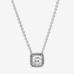 Elegance never goes out of style and this timeless collier necklace in sterling silver will serve you as a staple in your collection for years to come. The necklace set with a square clear cubic zirconia for a full-on sparkle effect The chain necklace is adjustable to three different lengths, so that you can create the perfect styling to match your look. Wear it alone for evening events or to add statement sparkle to daytime looks. - Pandora Square Sparkle Halo Necklace - Sterling silver / Cubic Zirconia / Clear - Sz. 17.7 in Classic Sterling Silver Solitaire Necklace With Square Pendant, Classic Diamond Necklace With Square Pendant, Classic Silver Necklace With Diamond Accents, Timeless Silver Necklace With Sparkling Stones, Classic Silver Square Pendant Jewelry, Classic Square Pendant Necklace With Diamond Accents, Classic Silver Solitaire Necklace With Sparkling Stones, Classic Sterling Silver Diamond Necklace With Sparkling Stones, Classic Solitaire Necklace With Sparkling Stones