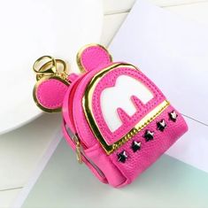 So Cute And Fashionable Bright Pink Minnie Mouse Mini Backpack Charm Pouch Or Keychain. Great For Your Cash Or Even Carrying Your Medicine . Makes A Great Gift For Any Age Or Occasion. Cute Pink Coin Purse For Daily Use, Cute Pink Pouch Coin Purse, Kawaii Pink Coin Purse For Daily Use, Pink Bags With Zipper Closure For Gifts, Pink Bag With Zipper Closure For Gift, Pink Bag With Zipper Closure As Gift, Cute Pink Coin Purse For Personal Use, Cute Pink Coin Purse With Zipper, Cute Pink Coin Purse With Zipper Closure