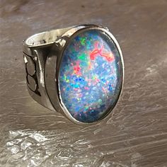 Unisex Ring Features Stunning Opal Triplet; This Ring Is Large And In Charge!!!!! Lots Of Fire And Spark. Handcrafted Artisan - Unique! Blue Opal Ring In Sterling Silver, Spiritual Style, Silver Opal Fusion Jewelry, Handmade Silver Opal Ring For Formal Occasions, Silver Fusion Opal Ring For Anniversary, Silver Fusion Style Opal Ring For Anniversary, Artisan Silver Opal Cabochon Ring, Handmade Blue Opal Rings, Rings Opal, M Jewelry