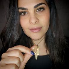 This beautifully crafted gold cactus necklace is both on trend, unique, and is bound to make even the most casual outfit a little more festive. ★ Comes in our signature box, ready for gift giving. ★ Available in Gold [18K goldfield & gold plated brass ] ★ Pendant size :1.20"x0.70" Thanks for shopping at ByYaeli♥ ... Succulent Jewelry, Cactus Necklace, Jewelry Design Studio, Meaningful Necklace, Mountain Jewelry, Mountain Necklace, Nature Necklace, Friend Necklaces, Geometric Necklace