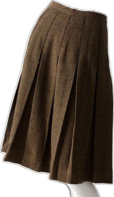 Brown Pleated Skirt With Pleated Hem For Fall, Fall Brown Pleated Skirt With Pleated Hem, Classic Brown Pleated Skirt, Classic Brown Wool Skirt, Brown Wool Pleated Skirt, Brown Vintage Wool Skirt, Vintage Brown Wool Skirt, Retro Pleated Brown Skirt, Vintage Pleated Fall Skirt For Workwear