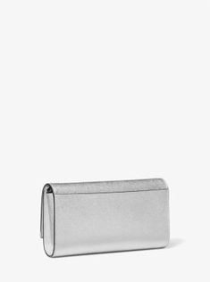 The sleek silhouette of our Mona clutch makes it a worthy investment. Crafted from metallic Saffiano leather, it’s accented with our Empire logo plaque and a detachable chain strap for hands-free wear. Inside, there’s just enough room for your keys, wallet and phone. Carry it in hand or slip it into a larger tote bag for an evening at a gallery opening or rooftop bar. Evening Wallet On Chain With Metal Logo, Rectangular Evening Wallet On Chain With Metal Logo, Elegant Evening Wallet On Chain With Metal Logo, Elegant Formal Wallet On Chain With Metal Logo, Chic Evening Wallet On Chain With Metal Logo, Classic Evening Wallet On Chain With Logo Plaque, Elegant Formal Wallet On Chain With Silver-tone Hardware, Chic Formal Wallet On Chain With Logo Plaque, Classic Formal Wallet On Chain With Logo Plaque