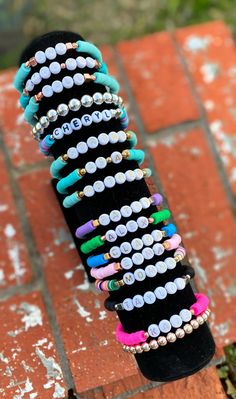 "Make a statement with these cute custom bracelets! You choose the name or word, the colors and accents! Wear them one at a time or stack them for a gorgeous custom look! Buy one for yourself and one for your best friend or loved one! Beautiful on their own and even more gorgeous paired with our metal round beaded bracelets! https://www.etsy.com/listing/987401020/beaded-bracelet-stackable-bracelets-gold These are a perfect addition to your own collection or a gift for any occasion. Great for sis