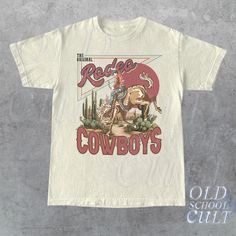 ABOUT THIS PRODUCT - Originally  designed by Oldschoolcult - Runs true to size (Relaxed fit) - For oversized fit go one sizes up your normal size - Comfortable unisex fit - 100% cotton - Professional high quality print TYPES - Available in given colors and sizes - See pictures for example ORDER & SHIPPING - It will take 1-4 business days to print and ship. Estimated shipping times are given but in almost all cases, the items are delivered before the latest date. AFTERCARE - Wash inside out at 30oC or 90oF - Do not dry clean or tumble dry RETURNS - As every item is made to order we usually cant accept returns - But if you have any issue with your item please contact us we are happy to help OTHER - If you have any questions regarding this product, don't hesitate to ask. Boy Closet, Cowboy Print, Rodeo Cowboys, Boys Closet, Merch Design, Rodeo Shirts, Rodeo Cowboy, Cowboys Shirt, Vintage 2000s