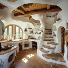 the interior of a house with stone stairs