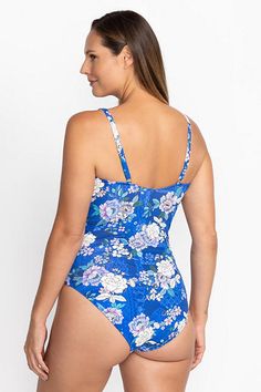 Perfect for poolside lounging and beach vacations, the Blue Dove Ruched One Piece is adorned in a vibrant blue floral print, full coverage, square neck, and ruching to create a flattering fit. Style with sandals and a breezy cover-up for a chic beach ensemble. Johnny Was Women's Blue Dove Ruched One Piece, Size 2XL, Floral Spring Lined Tankini For Pool, Spring Beachwear Swimwear With Square Neck, Blue Floral Print Tankini For Spring, Square Neck Beachwear Swimwear For Spring, Spring Beachwear With Square Neck, Blue Floral Print Tankini For Sunbathing, Blue Floral Print Tankini For Poolside, Blue Floral Print Tankini For Beach Season, Blue Ruched Swimwear For Sunbathing