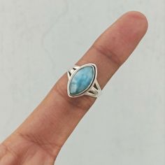 "Important : PLEASE ENTER YOUR PHONE NUMBER IN THE \"NOTE TO SELLER\" SECTION DURING CHECKOUT, SO THAT THE DELIVERY CAN BE HASSLE FREE. Material: Solid Sterling silver Stone: Larimar stone size: varies( According to the ring sizes) ships worldwide from India 925 stamped Handmade item Our products are totally handmade and made with high quality gemstones and 925 solid sterling silver. If you believe in buying top quality products for yourself and for your family and friends, SilverDynasty is the Unique Turquoise Larimar Gemstone Ring, Unique Turquoise Larimar Ring, Adjustable Larimar Turquoise Ring, Adjustable Turquoise Larimar Ring, Unique Larimar Turquoise Ring As Gift, Silver Larimar Promise Ring, Bohemian Larimar Ring As A Gift, Unique Silver Larimar Rings, Stamped 925 Larimar Rings As A Gift