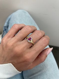 Vintage Ruby Ring, 0.60 CT Oval Shape Natural Ruby, 10k Yellow Gold, Estate jewelry, bypass shank, pink ruby ring, oval ring, ruby jewelry Jewelry Material: Yellow Gold 10k (the gold has been tested by a professional) Total Carat Weight: 0.66ct (Approx.) Total Metal Weight: 2.55g Size: 8 US  Grading Results: Stone Type: Ruby Shape: Oval Carat: 0.6ct (Approx.),Stones quantity:1 Color: Red-Pink Grading Results: Stone Type: Diamonds Shape: Round Carat: 0.06ct (Approx.),Stones quantity:12 Color: H C Vintage Ruby Ring, Ruby Ring Vintage, Ring Ruby, Pink Ruby, Oval Ring, Oval Rings, Ruby Jewelry, Ring Oval, Jewelry Manufacturers