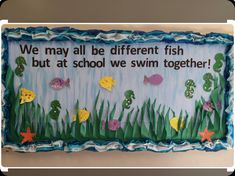 there is a cake that says we may all be different fish but at school we swim together