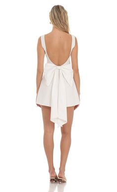 High Neck Back Bow Dress in White | LUCY IN THE SKY Dresses With Bows, Graduation Fits, Back Bow Dress, Bow Back Dress, White Dresses Graduation, Lucy In The Sky, Bow Dress, Bow Back, Halter Mini Dress