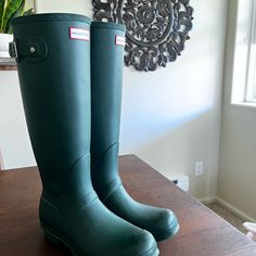 Hunter Rain Boots In Hunter Green, Size 8m, 9f. These Boots Have Been Gently Used. They Work Perfectly For Keeping Your Feet Dry And Stylish While Doing It. Per Website “The Fsc-Certified Original Wellington Boot Was Crafted Using Natural Rubber From Forests Independently Audited To Forest Stewardship Council Standards. These 100% Waterproof Boots Are Handcrafted To Strict Standards To Protect Forests, As Well As The Animals And Communities That Depend On Them.” Tall Rain Boots, Wellington Boot, Hunter Rain Boots, Hunter Shoes, Women Hunters, The Animals, Waterproof Boots, Hunter Green, Natural Rubber