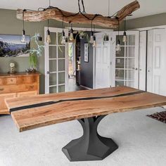 a large wooden table sitting in the middle of a room