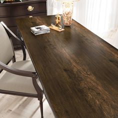 a large wooden table with chairs around it