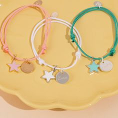 Playful and pretty, this engraved Personalized Enamel Star Bracelet is perfect for anyone wanting to add a pop of colour to their bracelet collection. Choose from a range of braid colors and enamel stars, paired with your unique, hand-engraved message.18K Champagne Gold Plated or 925 Sterling SilverMini flat disc: 04 Diameter, 0.02 ThicknessMini Star: 0.4 x 0.4Braid made of durable, colourfast polyesterFully adjustable sliding knot fasteningHand engraved in our Paris workshopSent with love in a Braid Colors, Organic Dog Treats, Adjustable Sliding Knot, Engraved Bracelet, White Turquoise, Sliding Knot, Star Bracelet, Pink Turquoise, Bracelet Collection