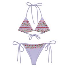 Stay comfortable and stylish all summer with this All-Over Print Recycled String Bikini set. It’s made from soft recycled polyester with double-layering and UPF 50+. Style the straps how you like, and get ready to swim! • Soft and stretchy material with UPF 50+ • Sizes up to 6XL • Bikini top comes with removable padding for comfort • Multiple ways to tie and style the bikini set • Color design options for swimwear lining Disclaimers: • Due to the 2-layered construction and internal stitching, a visible stitch may appear in the crotch seam of the bikini bottom. This is a normal part of the manufacturing process and does not impact the quality or performance of the product. • To make your All-Over Print Recycled String Bikini last longer, thoroughly rinse it off after each use and get rid of Festival Swimwear With Adjustable Straps, Festival Swimwear With Adjustable Straps And Stretch, Summer Festival Triangle Top Tankini, Summer Festival Tankini With Triangle Top, Summer Festival Swimwear With Adjustable Straps, Adjustable Straps Summer Swimwear For Festivals, Strawberry Heart, Strawberry Hearts, 50 Style