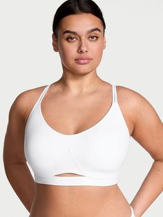 Double-strap, cross-back styling and an underbust cutout detail are trendy touches to this lightly padded style. Ideal for low-impact activities, it's one you'll want to keep in your athleisure rotation. Light support Pull-on style for easy on and off All-day wireless comfort Light padding provides shape and support Turbo Wick® liner keeps you cool & dry Sleek, bonded finishes 4-way stretch moves with you Double cross-back straps Cutout front detail Machine wash Imported Sport Bras, Victoria Secret Bras, Bra Women, Back Strap, Athleisure, Victoria’s Secret, Apparel Accessories, Sports Bra, Sleek