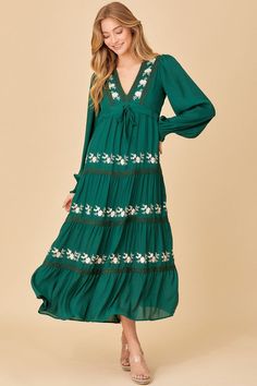 Green V-neck Embroidered Dress For Spring, Green V-neck Dress With Floral Embroidery, Spring Green Embroidered V-neck Dress, Green Long Sleeve Embroidered Dress With Resham Embroidery, Spring Maxi Length Embroidered Dress With Intricate Embroidery, Fall Floral Embroidered Maxi Dress, Fall Maxi Length Embroidered Dress With Floral Design, Fall Maxi Embroidered Dress With Floral Design, Bohemian Green Dress With Embroidered Hem