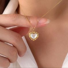 Stainless Steel 18k Pvd Gold Platednatural Shell Heart Retro Vintage Feel Necklace. Dainty Heart Necklace. Lobster Claw Closure. Great Gift Idea. #Giftforher #Giftfordaughter #Giftformother #Giftforgrandmother Bin: G White Plated Necklaces As Gift, Gold Heart Necklace With Pearl Pendant For Valentine's Day, Elegant Heart Beads Jewelry As A Gift For Her, Dainty Gold Heart Necklace With Pearl Pendant, Delicate Tarnish Resistant Necklaces For Valentine's Day, Delicate Tarnish-resistant Necklace For Valentine's Day, Valentine's Day Gold Heart Necklace With Pearl Pendant, Gold Heart Necklace With Pearl Pendant, Elegant Gold Necklaces With Heart Beads