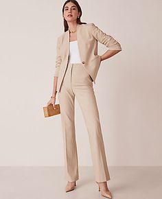 Refined four-way stretch holds its shape while flattering yours - so you stay polished and comfortable from A.M. to P.M. Front zip with hook-and-bar closure. Front off-seam pockets. Back besom pockets. Shop all Bi-Stretch Suiting,Leg Shape:Leg Shape: Trouser – a pant with a bit of flare that lengthens legs,Rise:High rise: sits 1/2" to 1" below natural waist,Imported:Imported,Fit:Fit: Tailored & fitted,Length:Full length: 30" inseam with 18 1/2" leg opening,Fabrication:66% Polyester, 28% Rayon, 6% Spandex,Garment Care:Machine Washable The Petite High Rise Skinny Trouser Pant in Bi-Stretch by Ann Taylor Size petite - 14 Toasted Oat Women's Regular, Trouser, Suit, Pants, Pants, 66%, Polyester, 28%, Rayon, 6%, Spandex, Machine, Washable Trouser Suit, Knitted Suit, 40 Dress, Style Steal, Suit Pants, Trouser Pants, Size 00, The High, Effortless Style