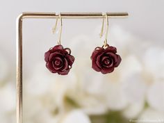 🤎Dainty Chocolate Color Rose Dangle Earrings / Chocolate Brown Rose with Gold Leaf Dangle Earrings/ Small Gift Box included 🤎  100% Brand New This listing is for ONE pair of Chocolate Brown Rose Dangle Earrings (with leaf or no leaf). Suitable for any occasion, these elegant earrings will emphasize your unique style. Ideal gift for yourself or loved one!  📍Material :  (No Leaf) Resin rose beads, Flower gold color hollow, Stainless steel earring hooks (With Leaf) Resin rose beads, Flower gold color hollow, Stainless steel earring hooks, Gold tone metal leaf, Plastic pearl beads  📍Dimensions :  (No Leaf) Length 1 inches(2.5cm)  Drop 1/2 inches(1.3cm) Width 5/8 Inches (1.6cm) (With Leaf) Length 2 inches(5cm)  Drop 1 inches(2.5cm) Width 5/8 Inches (1.6cm)  📍Mini Gift Box Size :  2 1/8 x 1 Rose Valentine's Day Earrings Gift, Elegant Adjustable Rose Design Earrings, Valentine's Day Rose Design Earrings Gift, Rose Red Flower Earrings For Valentine's Day Gift, Delicate Rose Earrings For Gift, Delicate Rose Design Flower Earrings For Gift, Rose Red Jewelry Set As Gift, Rose Red Dangle Earrings For Gift, Rose Red Earrings With Rose Design For Gift