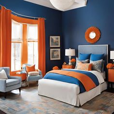 a bedroom with blue walls and orange accents