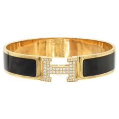 Hermes Clic Clac H Diamond and Black Enamel Bangle Bracelet For Sale at 1stDibs | hermes black bracelet, hermes bracelet Bracelet Hermes, Hermes Bracelet, Diamond Bangle Bracelet, Black Bracelet, Enamel Bangle, Diamond Bangles Bracelet, Black Bracelets, Diamond Bangle, Black Enamel