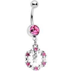 a pink belly ring with stars on the bottom and a circular design hanging from it