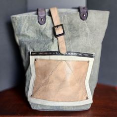 Due To A Family Emergency, I Find Myself Needing To Sell My Designer Handbag Collection. Please View My Other Items. There Will Be More Posted Everyday. All Offers Are Welcome. Pet Free / Smoke Free *Discounted Shipping* Nwot Moto Glam Tote Bag By Mona B This Bag Has Been Stored Since Purchased. The Only Blemish Is ~4 Stitches On The Corner Of The Back Pocket Did Not Sew. It Came That Way. Given The Upcycled Nature Of Mona B Items, It Is Not Noticeable And Does Not Alter Function In Any Way. A R Coated Canvas Bags With Large Capacity For Errands, Khaki Tote Bag For On-the-go, Large Capacity Coated Canvas Bag For Errands, Coated Canvas Bucket Satchel, Green Canvas Shoulder Bag For On-the-go, On-the-go Bucket Bag In Coated Canvas, Large Capacity Bucket Shoulder Bag In Coated Canvas, Coated Canvas Bucket Shoulder Bag For Travel, Large Capacity Coated Canvas Bucket Shoulder Bag