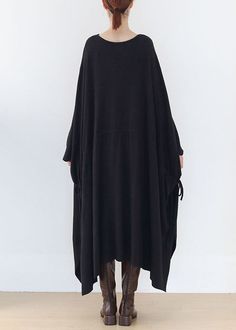 Original Black Drawstring Baggy Asymmetrical Cotton Long Dress Batwing SleeveFabric: CottonSize & Fit: Fit: This garment fits true to size.Length: Size 5XL measures 42.12"from shoulder to hemBust: Great for any cup size. Waist: Loose Fit. Comfortable room throughout midsection.Hip: Loose Fit - room for hips. Hand Wash Cold. Black Asymmetrical Baggy Bottoms, Black Oversized Batwing Sleeve Outerwear, Cotton Long Dress, Comfortable Room, Batwing Sleeve, Bat Wings, Cup Size, Long Dress, Loose Fitting