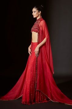 Red silk organza cape with crystal embellishments. Comes with net sharara and a crop top with big stone work. - Aza Fashions Red Organza Sharara With Unstitched Blouse, Elegant Red Anarkali Set With Unstitched Blouse, Red Organza Blouse Piece For Reception, Red Anarkali Dupatta For Evening, Red Organza Floor-length Sets, Red Evening Sets With Unstitched Blouse, Elegant Red Organza Sharara, Red Evening Set With Sheer Dupatta, Red Sharara With Traditional Drape For Evening