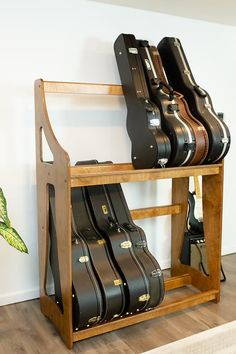 a rack with guitars and cases on it