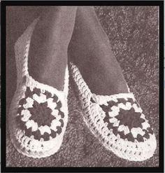 a pair of crocheted slippers is shown in black and white, with an image of a woman's legs