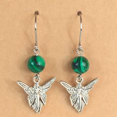 Malachite and Fairy dangle drop earrings Handcrafted 1.75" long including ear wires Stainless Steel ear wires,silver plated charms 1636-P17 Artisan Jewelry Earrings, Handcrafted Artisan Jewelry, Artisan Jewelry, Ear Wires, Silver Plate, Silver Plated, Dangle Drop Earrings, Jewelry Watches, Hand Crafted