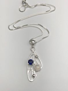 I've fabricated a bohemian fakery wing style necklace to which I simply adore. This piece is made entirely in sterling silver with a 6mm Cabochon, of your choosing, and comes with a 5mm sapphire. I like Fae whimsical pieces and will be adding more to my collection soon. Each one I make will vary slightly due to the handmade quality and integrity and care of each one. These are made by me, at my bench studio. It will be a large statement necklace, at approximately 1,75 inches in length and approx Bohemian Moon Phase Necklace In Sterling Silver, Bohemian Sterling Silver Moon Phase Necklace, Artisan Silver Necklace With Moon Phase Detail, Artisan Silver Necklace With Moon Charm, Bohemian Sterling Silver Teardrop Pendant Necklaces, Artisan Silver Necklace With Moon Phase, Bohemian Sterling Silver Gemstone Necklaces, Bohemian Sterling Silver Gemstone Necklace, Bohemian Moonstone Birthstone Necklace