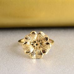 Large Vintage Style Dainty Brass Rose Ring SIZE :- All Size Are Available, choose from variation. METAL :- Brass ❥ Customers satisfaction is our biggest priority, please contact us with any questions/queries for future or existing orders, and we will do our best to make sure you are happy with your order. ♥ Please Make Sure to Include The Correct Address During Before Order. You Can return Item within 30 Days After Successful Delivery. We Offer 100% Money Back Guarantee If You Not Satisfied With Your Purchase. Return Charge Will Be Paid By Buyer Only. This is my shop link https://www.etsy.com/in-en/shop/AustereGifts?ref=seller-platform-mcnav Thank you🥰 for shopping with us! Gold Flower Ring, Daisy Ring, Dragon Jewelry, Floral Ring, Rose Ring, Wide Band Rings, Thumb Rings, Ring Dainty, Birth Flower