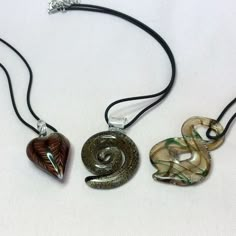 Lampwork Pendant Comes On An Adjustable Leather Cord. 1. Brown/Black Striped Heart, 2 1/8” (Yec), 2. Golden Glitter Swirl, 2.5” (Ylc) Or 3. Figure 8, 2.5” (Kcc). All Come With Leather Cord Adjustable Necklace That Can Be Worn From 17.5-20”. Thanks! Physical Manifestation, Striped Heart, Funky Accessories, Lampwork Pendant, Fan Necklace, Blue Statement Necklace, Floating Necklace, Diy Jewelry Unique, Crystal Fashion