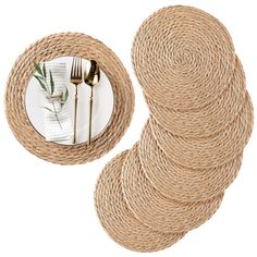 the place setting is made out of jute and has silverware on it, along with two plates that are wrapped in twine