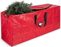 a red bag with a christmas tree in it