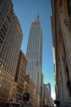 the empire building towering over other tall buildings