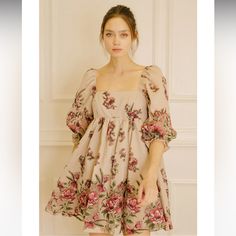 A Pretty Little Floral Mini Dress For Your Next Spring/Summer Event. Dress It Up With Heel Sandals Or Dress It Down With Sneakers. Accessorize It With Your Favorite Pretty Little Headband. It Features A Square Neckline, 3/4 Puffy Sleeves, And Bust Darts. It Also Has A Gathered Waist And A Back Zipper For Of/On Access. 50% Cotton, 50% Polyester. Spring Mini Dress With Puff Sleeves, Red Puff Sleeve Summer Dress, Red Puff Sleeve Mini Dress For Spring, Summer Mini Dress With Puff Sleeves For Garden Party, Red Puff Sleeve Dress For Day Out, Beige Puff Sleeve Mini Dress For Garden Party, Cute Red Puff Sleeve Dresses, Red Puff Sleeve Dress For Garden Party, Summer Mini Dress With Puff Sleeves And Floral Print