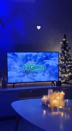 the grinch christmas party is on tv in the living room